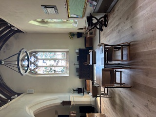 View of church with new wooden flooring and tables
