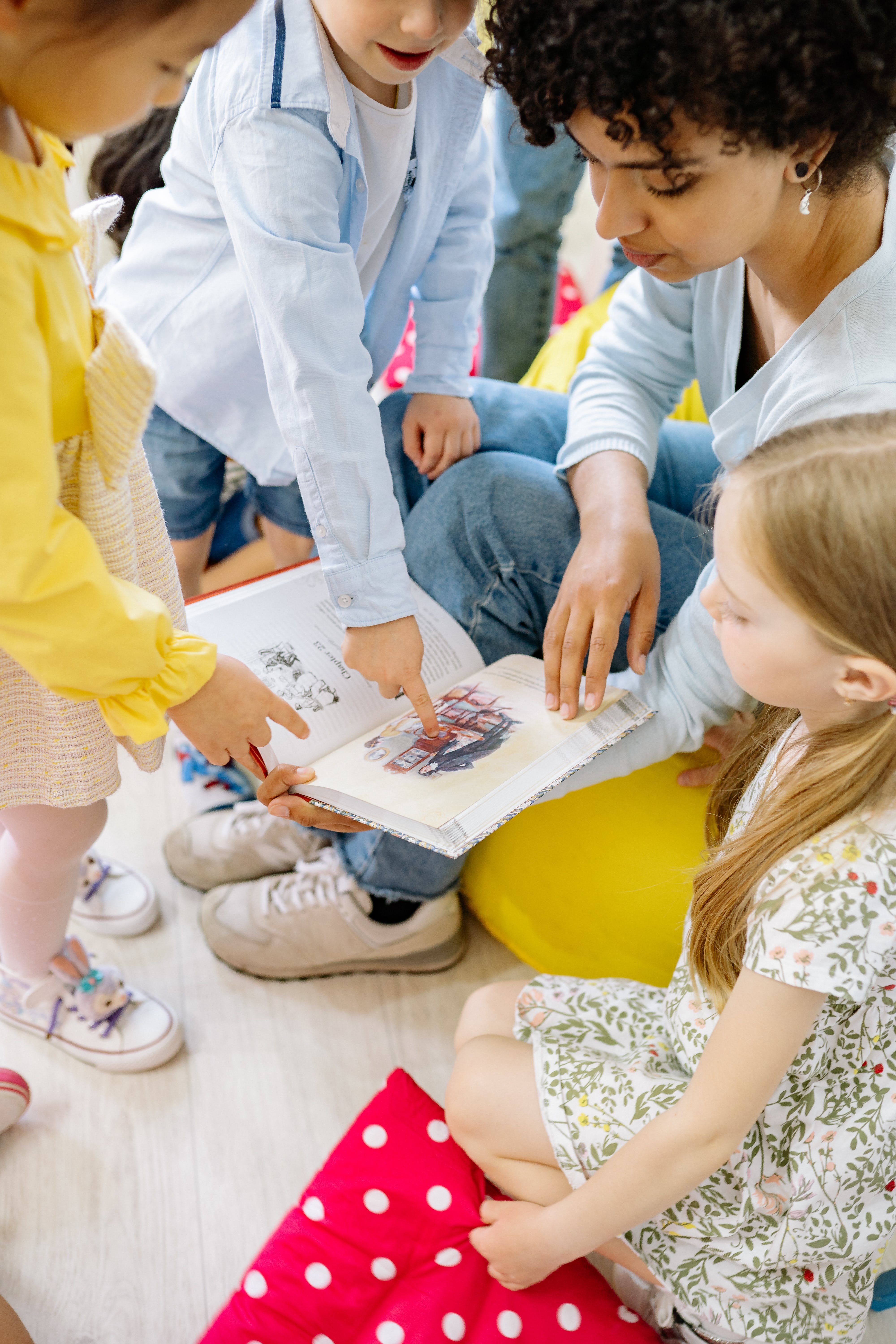 Woman reading with children